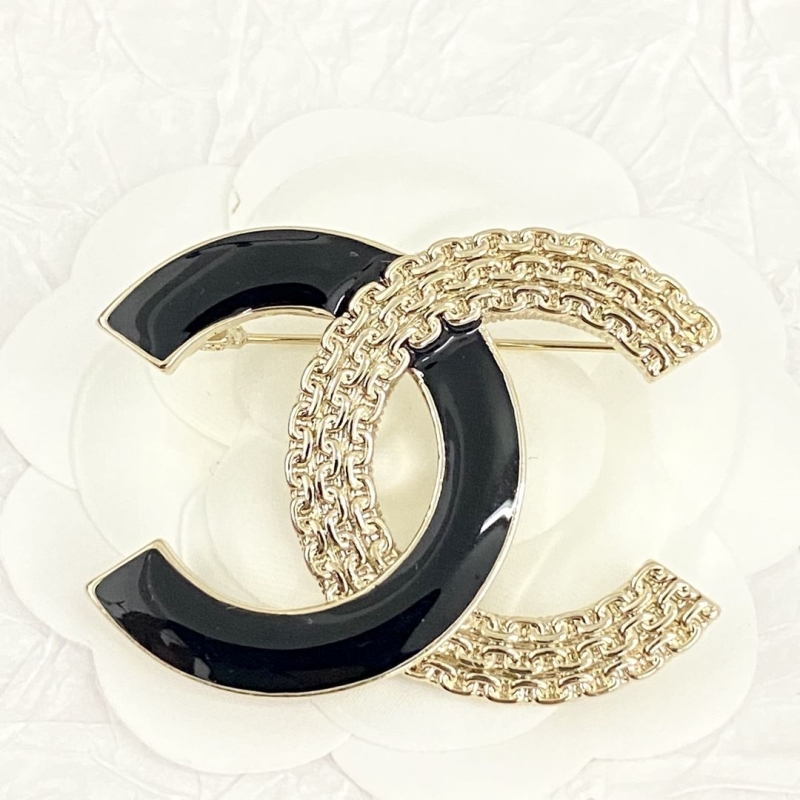 Ch*el brooches